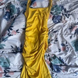golden-yellow bodycon dress